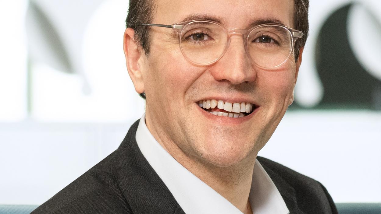 Quote from Laurent Lefèvre, Head Customer Interfaces at SIX, highlighting cost-effective access to awarded financial data from SIX. 